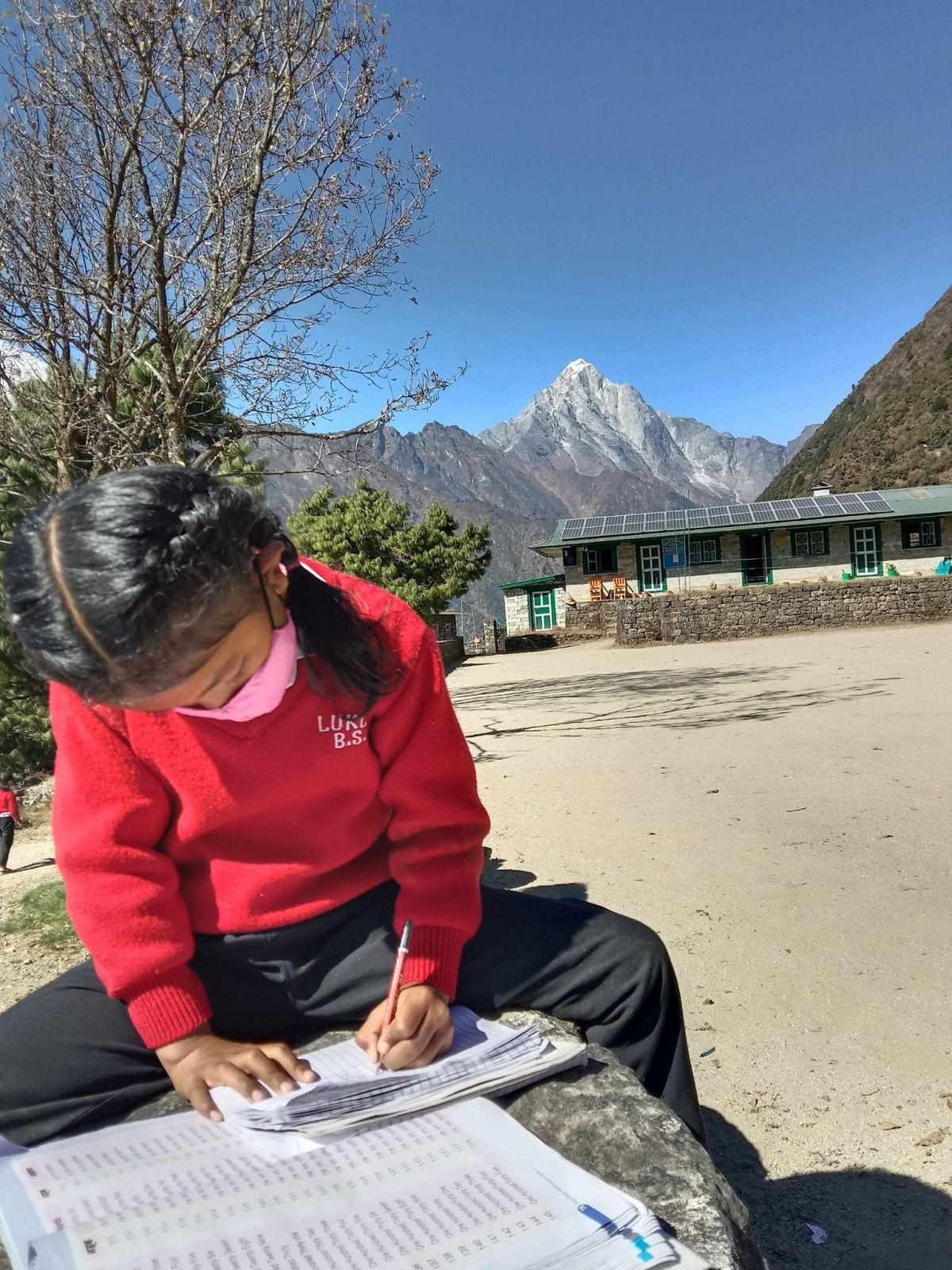 Mid Wirral sponsor creation of Learning Centres in Nepal  - Student outside school in Nepal 